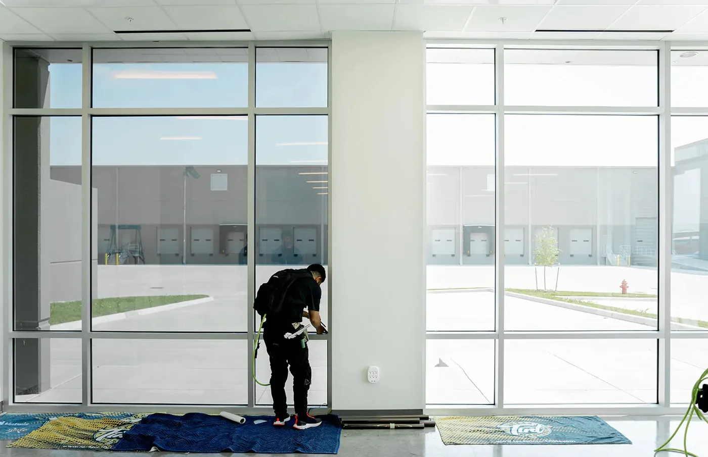 Retro Styling installing commercial window film on a glazed façade